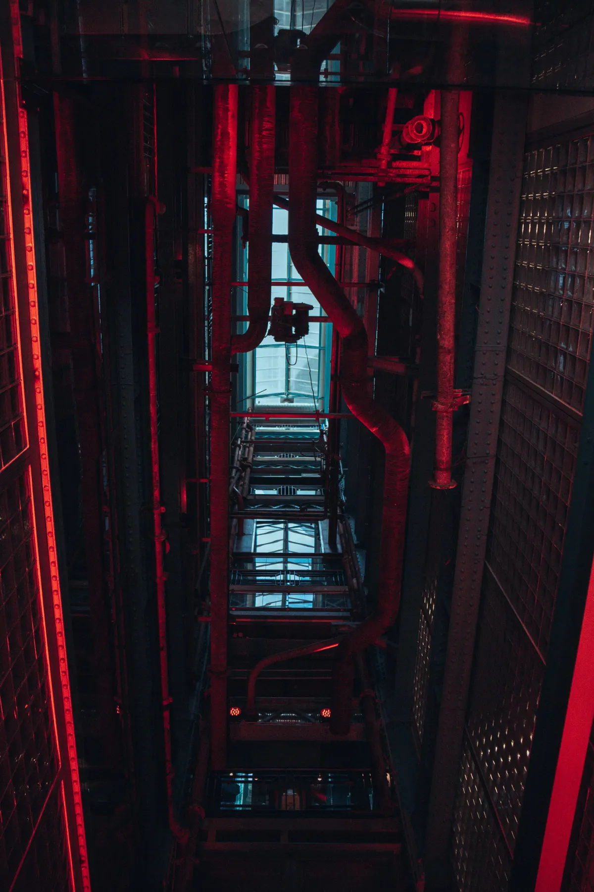 Mobadly traffic operations center with red-lit server racks monitoring live in-app ad campaigns